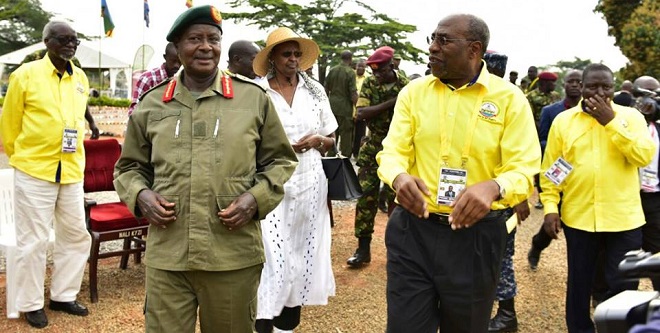 Museveni talks to PM Ruhakana Rugunda before one of the sessions at Kyankwanzi