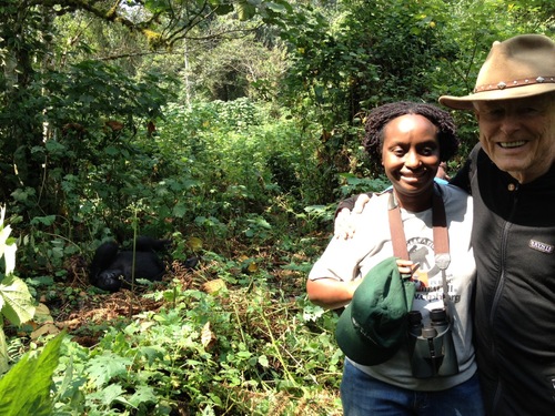 WINGS Fellow Gladys Kalema-Zikusoka shows Alan Nichols, president of the Explorers Club, the gorillas she is working with in the Biwindi National Forest in Uganda.