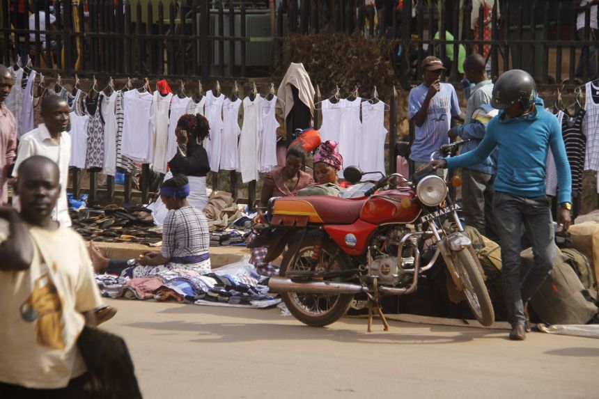 Traders sell their mechandise in Kampala's Central District. PHOTO NEXT CITY