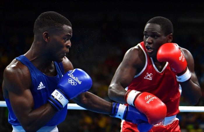 Great Britain's Joshua Buatsi (L) fights Uganda's Kennedy Katende during the Men's Light Heavy (81kg) boxing match at the Rio 2016 Olympic Games at the Riocentro - Pavilion 6 in Rio de Janeiro . AFP PHOTO