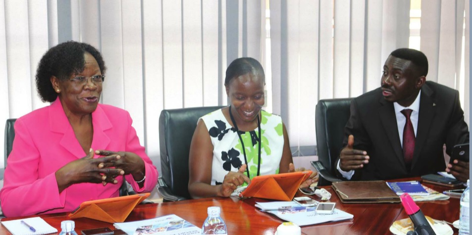 UEGCL chairman Stephen Isabalija shares alight moment with board members Zeridah Zigiti and Proscovia Margaret Njuki at their AGM. INDEPENDENT/ P KAGENDA
