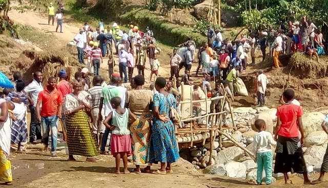 Kasese residents build temporary bridge to ease transport